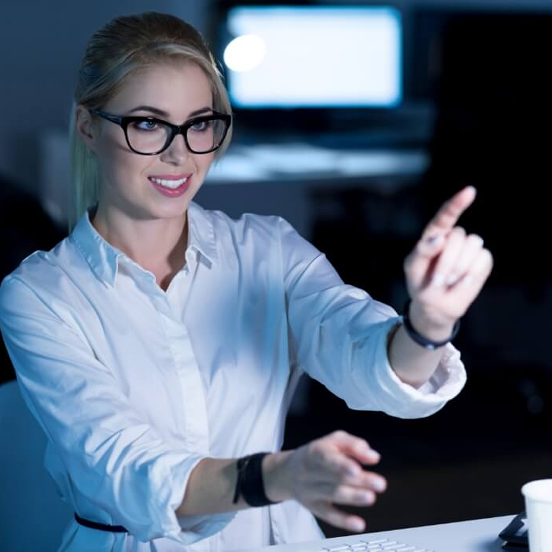 Woman pointing at screen